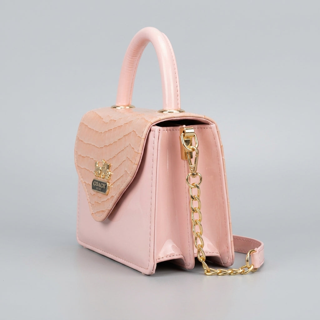 Blush pink croc-embossed mini top-handle bag with gold chain strap