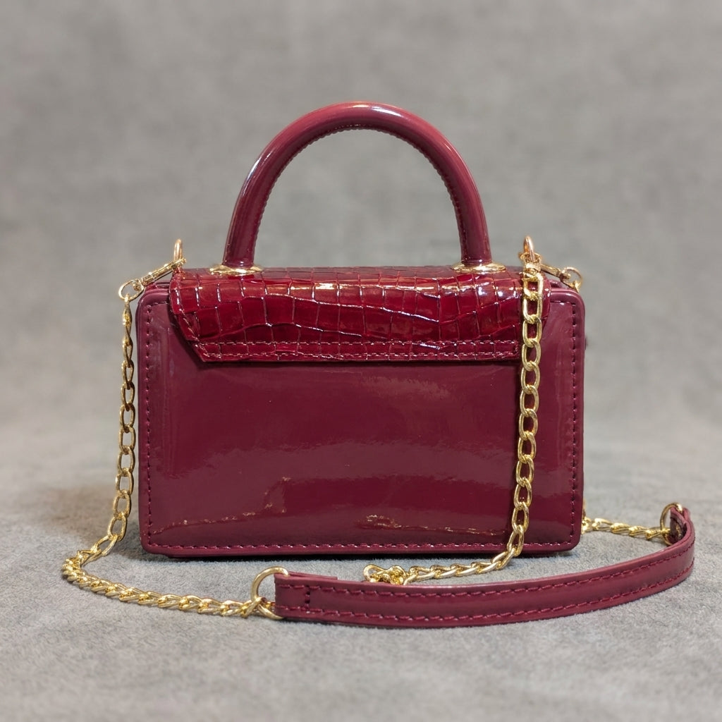 Wine red croc-embossed mini top-handle bag with gold chain strap