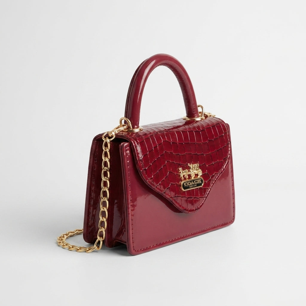 Wine red croc-embossed mini top-handle bag with gold chain strap